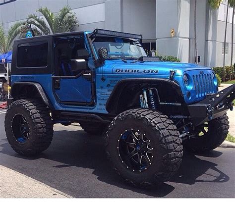 BLUE 2 DOOR WITH A 6 IN LIFT CUSTOMIZED WITH GREAT LOOKING WHEELS ...