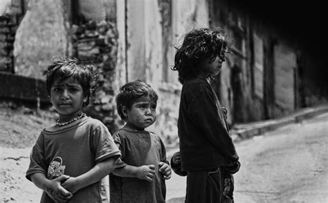 Black and White Photograph of Children on a Street · Free Stock Photo