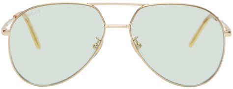 Gucci: Gold Aviator Sunglasses | SSENSE