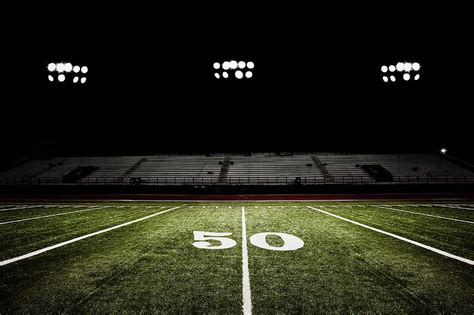 Fifty-yard Line Of Football Field At Photograph by Jgareri - Fine Art ...