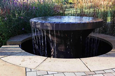 bespoke water feature in contemporary garden by Rose Lennard/ or dog ...