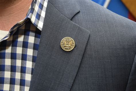 How Custom Lapel Pins are Used to Brand a Business -DesignBump