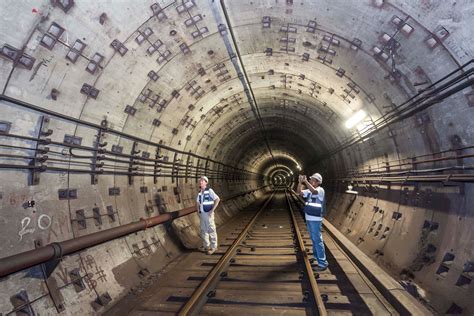 engineers inspecting subway tunnel | engineering photographer Singapore