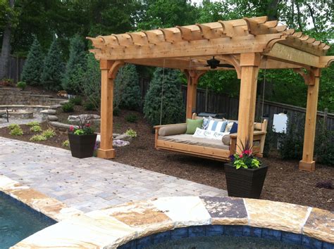 Pergola and swing bed -- love the fan over this one!!! #PergolaBraces ...