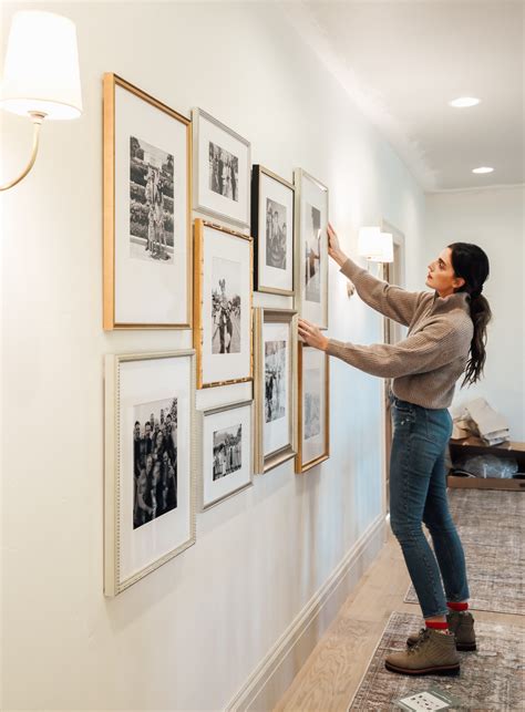 A Family Photo Gallery Wall in the Upstairs Hall - Chris Loves Julia