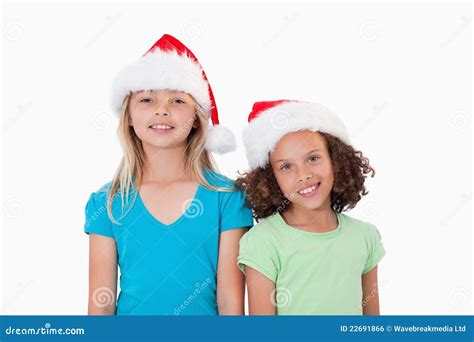 Girls with Christmas hats stock photo. Image of people - 22691866