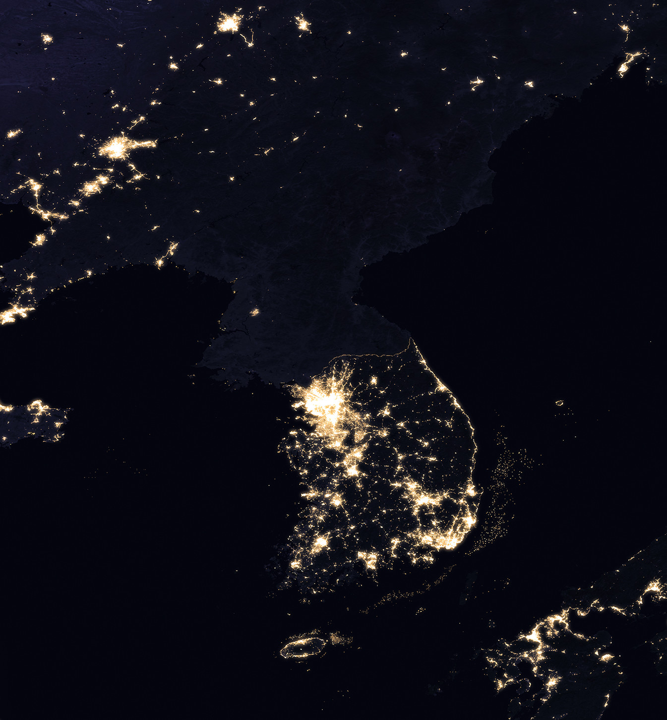 (/Graphics/Korean_Peninsula_At_Night/JPG/Korean_Peninsula_at_night_from_space.jpg