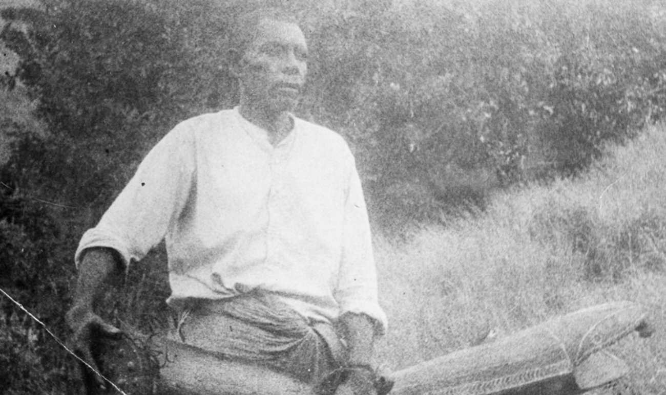 Image of Reverend Joseph Lui, holding the last of the great Zogo (sacred) drums