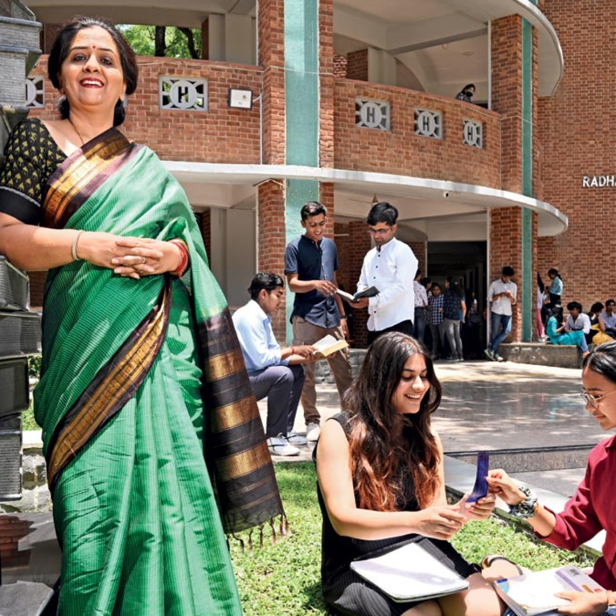 Hindu College Principal Anju Srivastava with students; (Photo: Chandradeep Kumar)