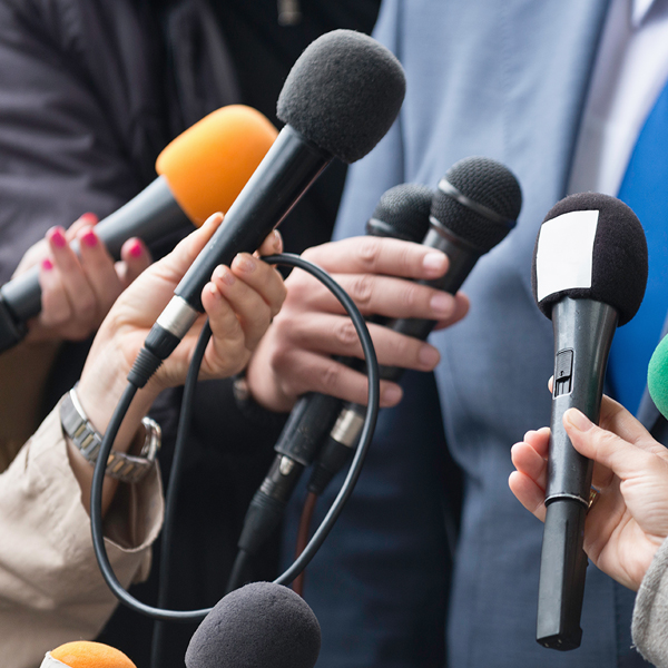 Media interview - Journalists surrounding VIP-Tile Image.jpg