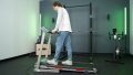 The Sunny Health & Fitness SF-T7603 Treadmill in a gym