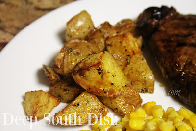 Small red or yellow potatoes, tossed with extra virgin olive oil, salt, pepper and dried herbs and roasted in the air fryer.