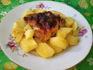 Potatoes in the Oven with Chicken Thighs