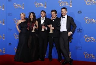 The cast of "Boyhood" poses with their award during the 72nd Golden Globe Awards in Beverly Hills