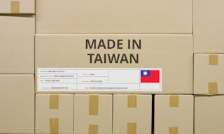 MADE IN TAIWAN text and flag label on the carton in a storage