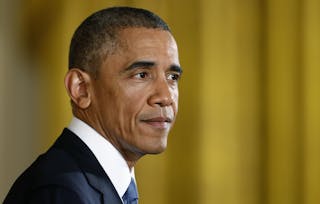 U.S. President Obama holds news conference in the East Room of the White House in Washington