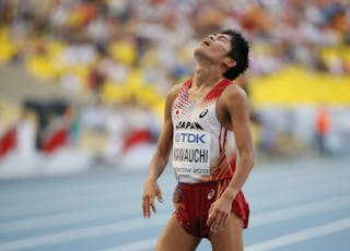 Kawauchi of Japan reacts after the men's marathon during the IAAF World Athletics Championships at the Luzhniki stadium in Mosco