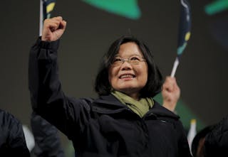 Democratic Progressive Party (DPP) Chairperson and presidential candidate Tsai Ing-wen gestures to her supporters after her elec