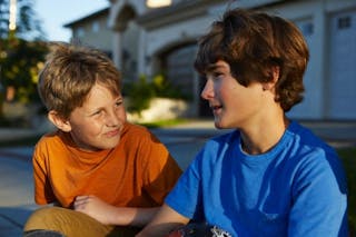 Two boys talking