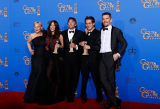 The cast of "Boyhood" poses with their award during the 72nd Golden Globe Awards in Beverly Hills