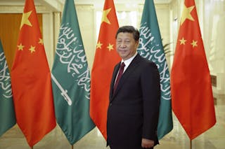 China's President Xi Jinping looks on after a welcoming ceremony for Saudi Arabia's Crown Prince Salman Bin Abdulaziz Al Saud in