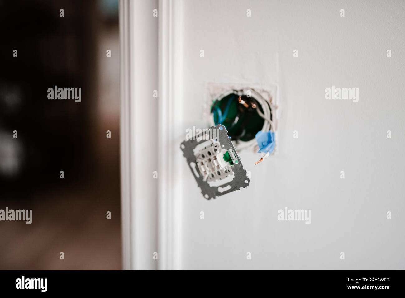 Electrical socket with front unscrewed Stock Photo