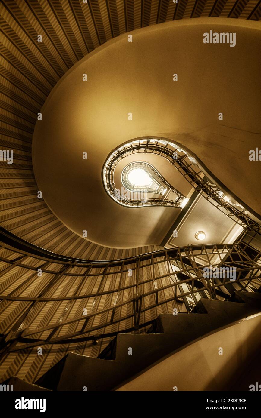 Light Bulb spiral staircase in the Cubist Museum at the House of the Black Madonna/Grand Orient Cafe, Prague, Czech Republic. Stock Photo