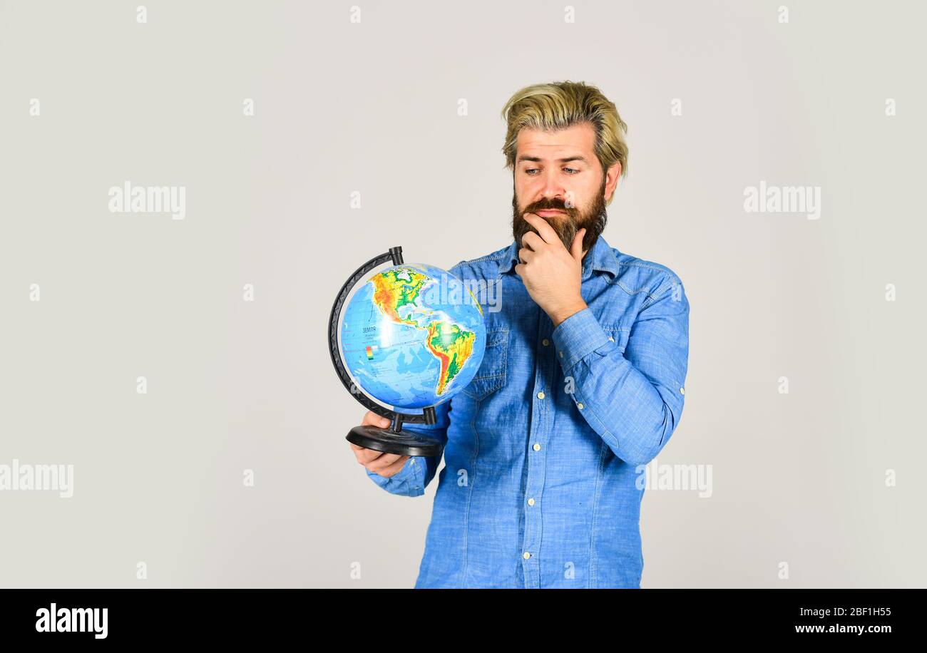 Let the Earth breathe. thinking bearded man with atlas. Social Media. concept of eco universe. back to school. ecology and media. The globe Earth. Global networking and international business concept. Stock Photo