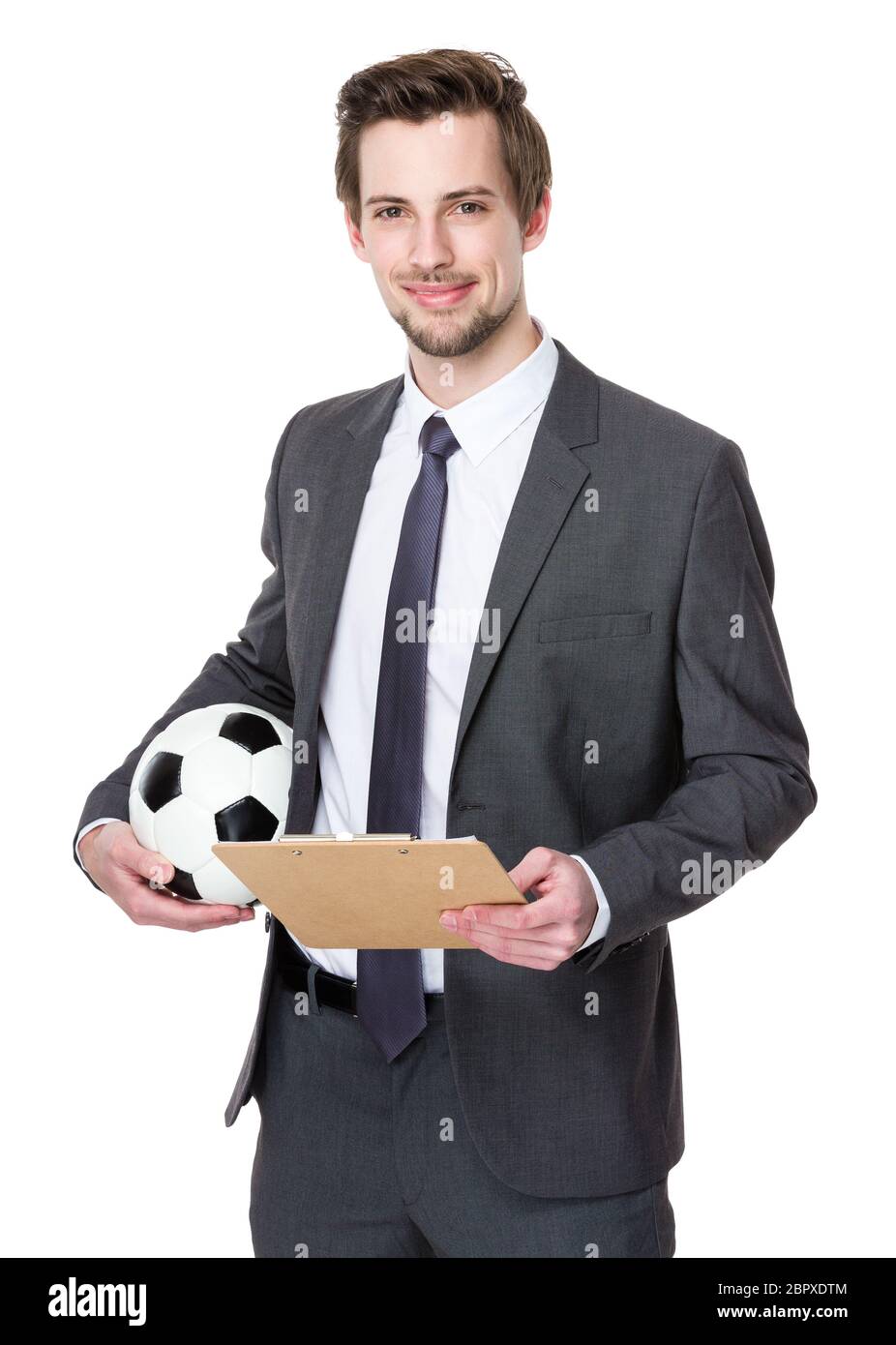 Soccer coach with clipboard and ball Stock Photo