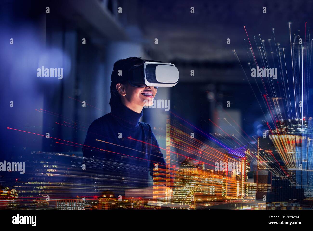 Smiling businesswoman using virtual reality glasses Stock Photo