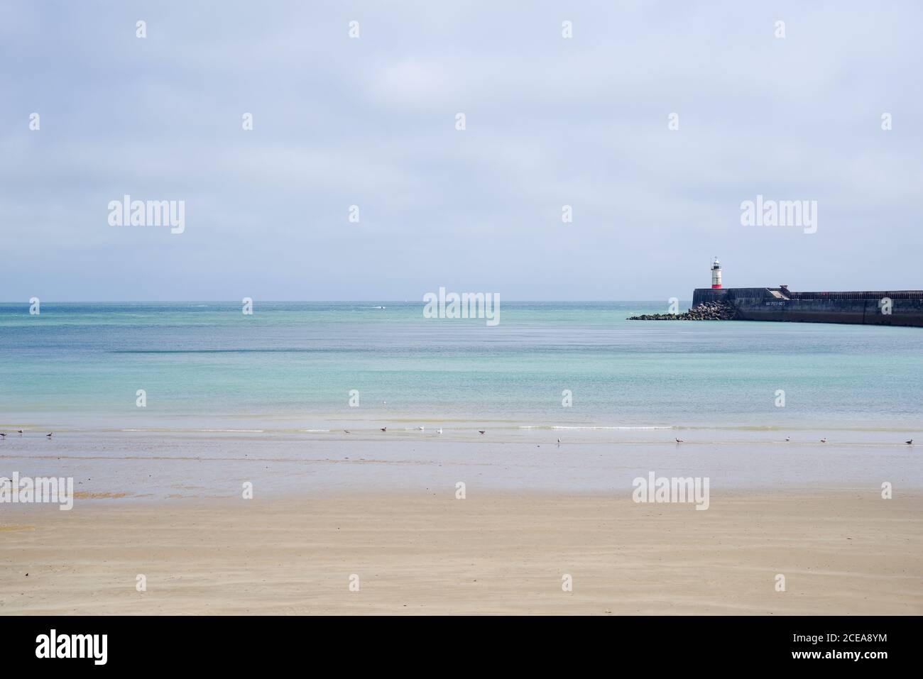 Newhaven West Beach and Harbour Arm - East Sussex, England Stock Photo