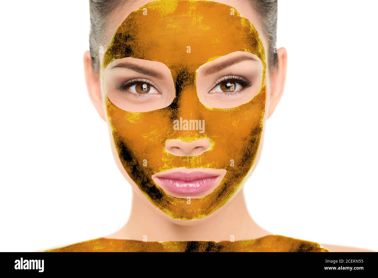 Luxury pure 24k gold mask sheet body wrap and facial treatment beauty Asian woman face portrait. Cosmetology skin care therapy with real golden sheet Stock Photo