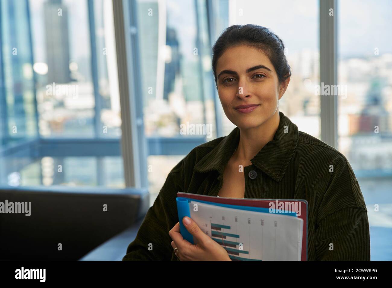 Portrait confident businesswoman in office Stock Photo