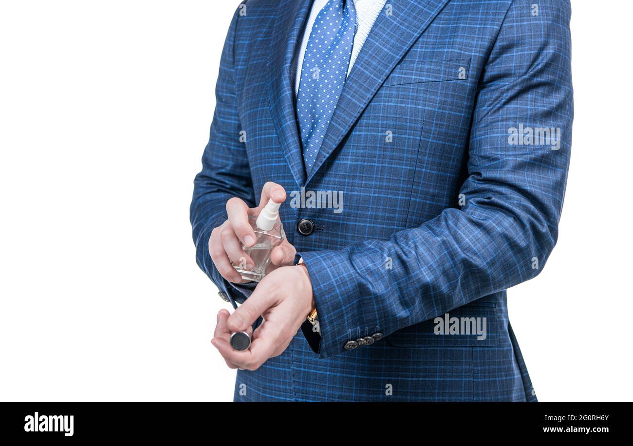 Pure luxury in bottle. Businessman apply perfume on wrist. Personal hygiene. Testing hygiene product Stock Photo