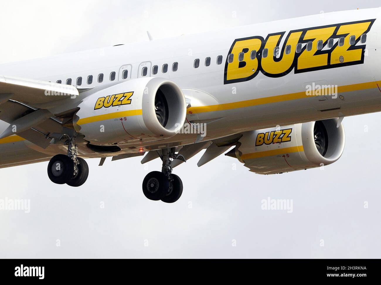 Boeing 737 MAX 8-200 airplane of  Ryanair and Buzz company, with a drawing of a bee on the tail, plate D-AIRY, approaching the Palma de Mallorca Stock Photo