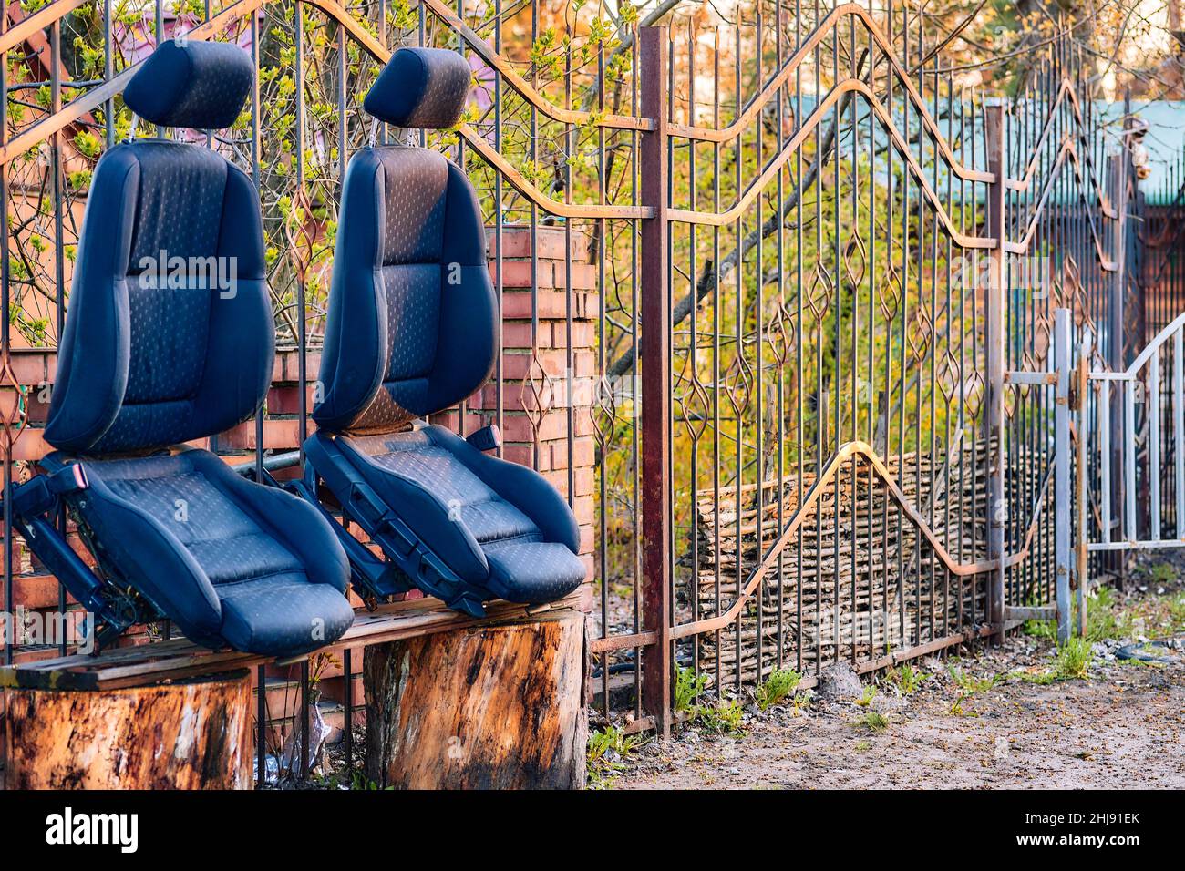 Two car seats drying in the sun after dry cleaning Stock Photo