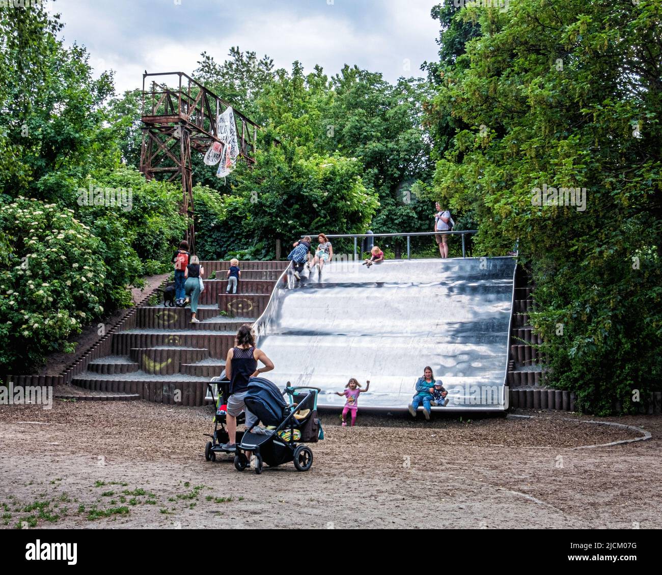 Metal Slide at the Lohmühle Children's playground, Alt-Treptow,Berlin,Germany. Situated on route of former Berlin Wall Stock Photo