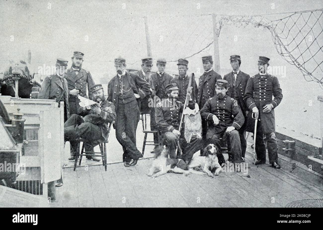 Group of officers on the deck of Monitor after a hunting trip Stock Photo