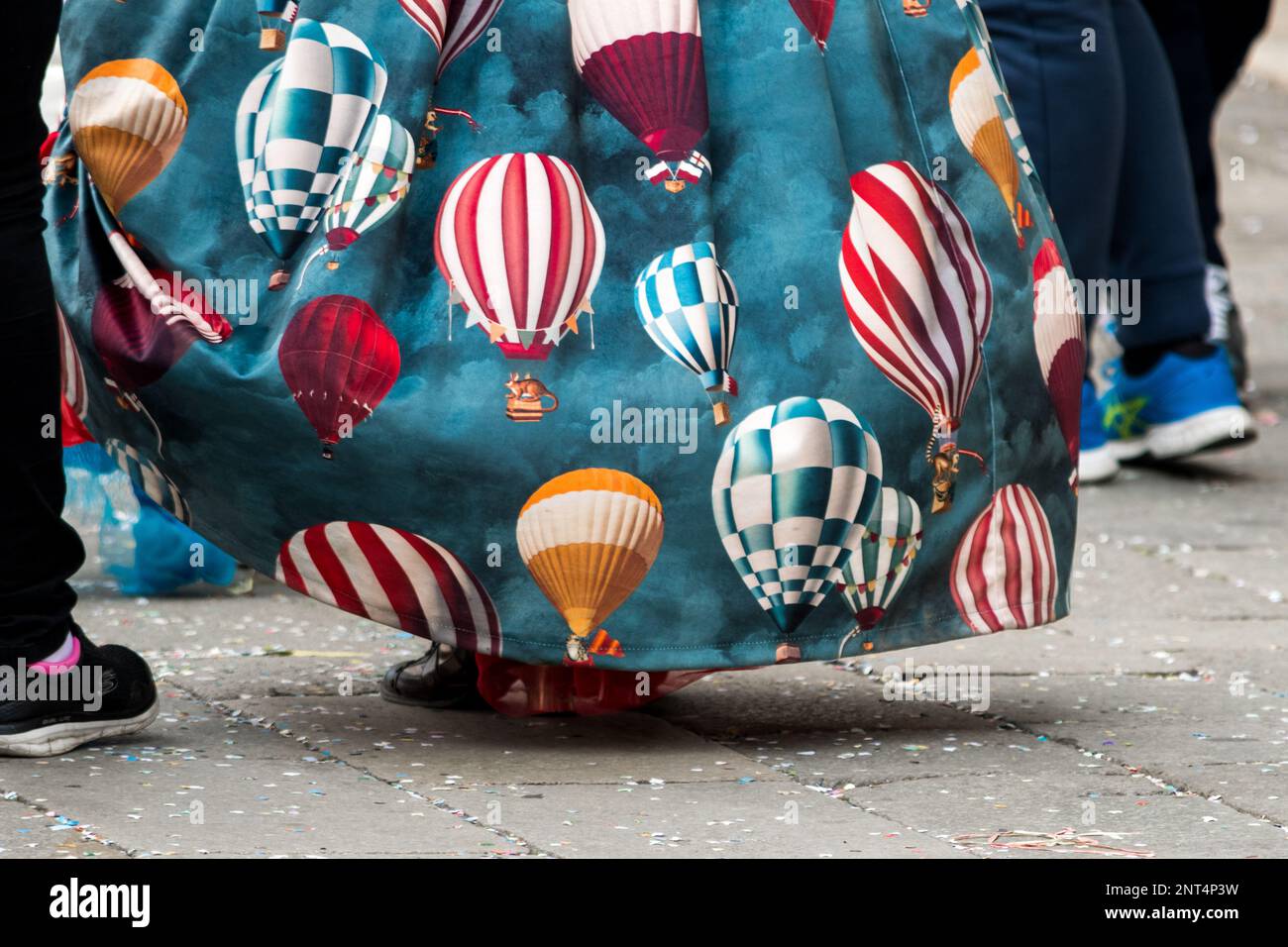 Details of a skirt with colorful hot air balloons. Masked party day in the city of Venice. Stock Photo