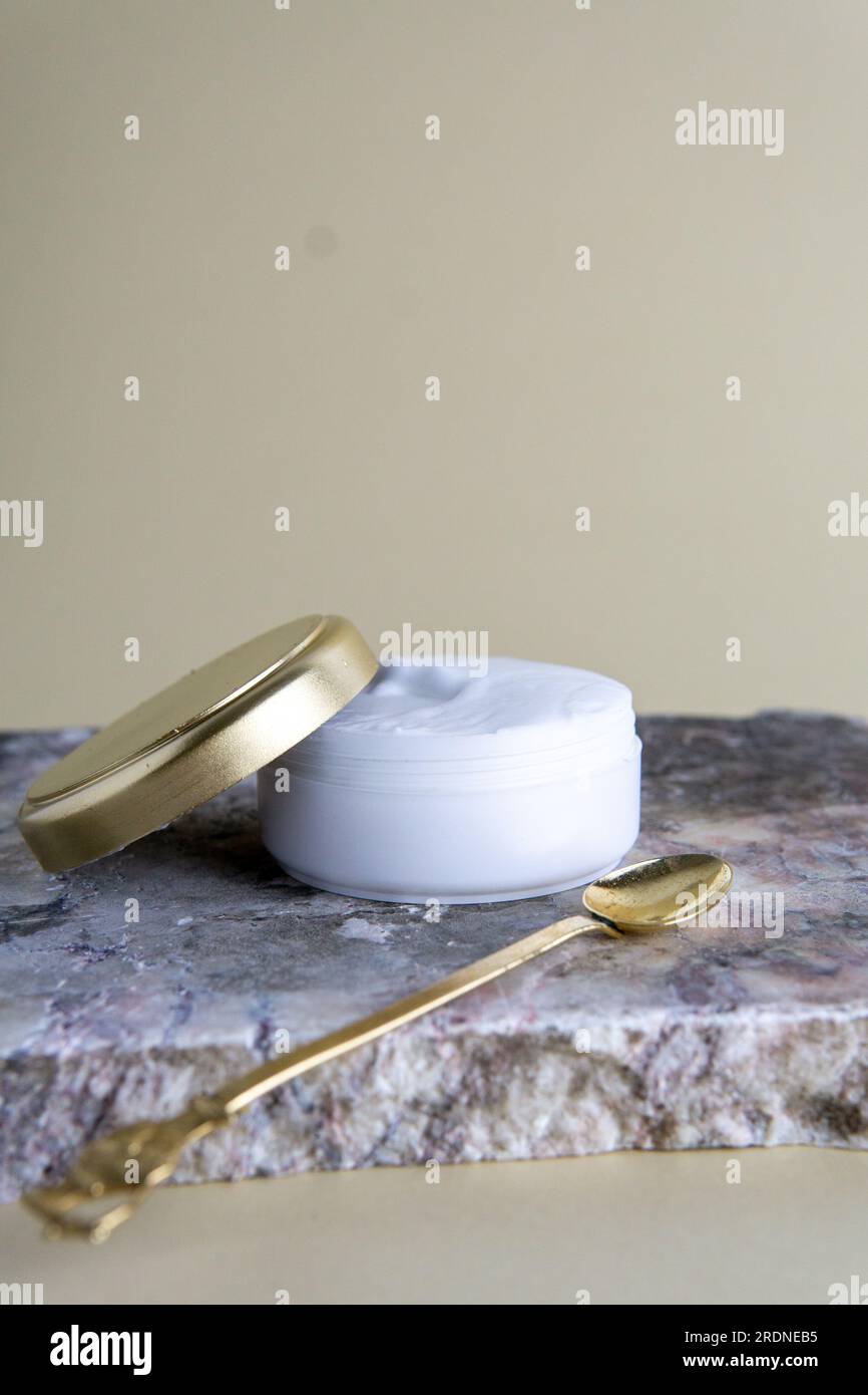 skincare products in white and gold packaging Stock Photo