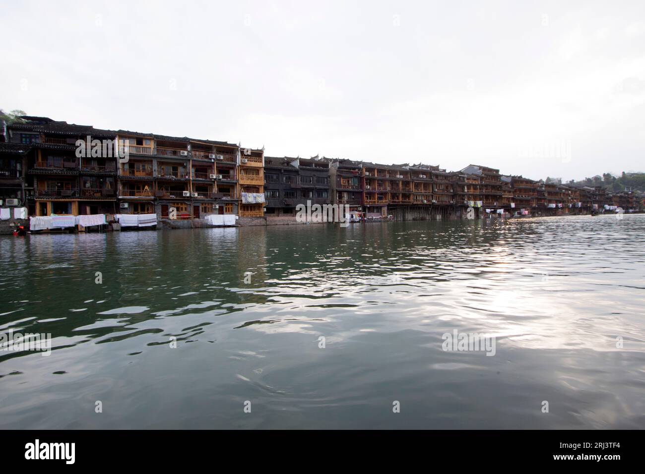 Phoenix County, April 15: House projecting over the water on April 15, 2012, Phoenix County, Hunan Province, China Stock Photo