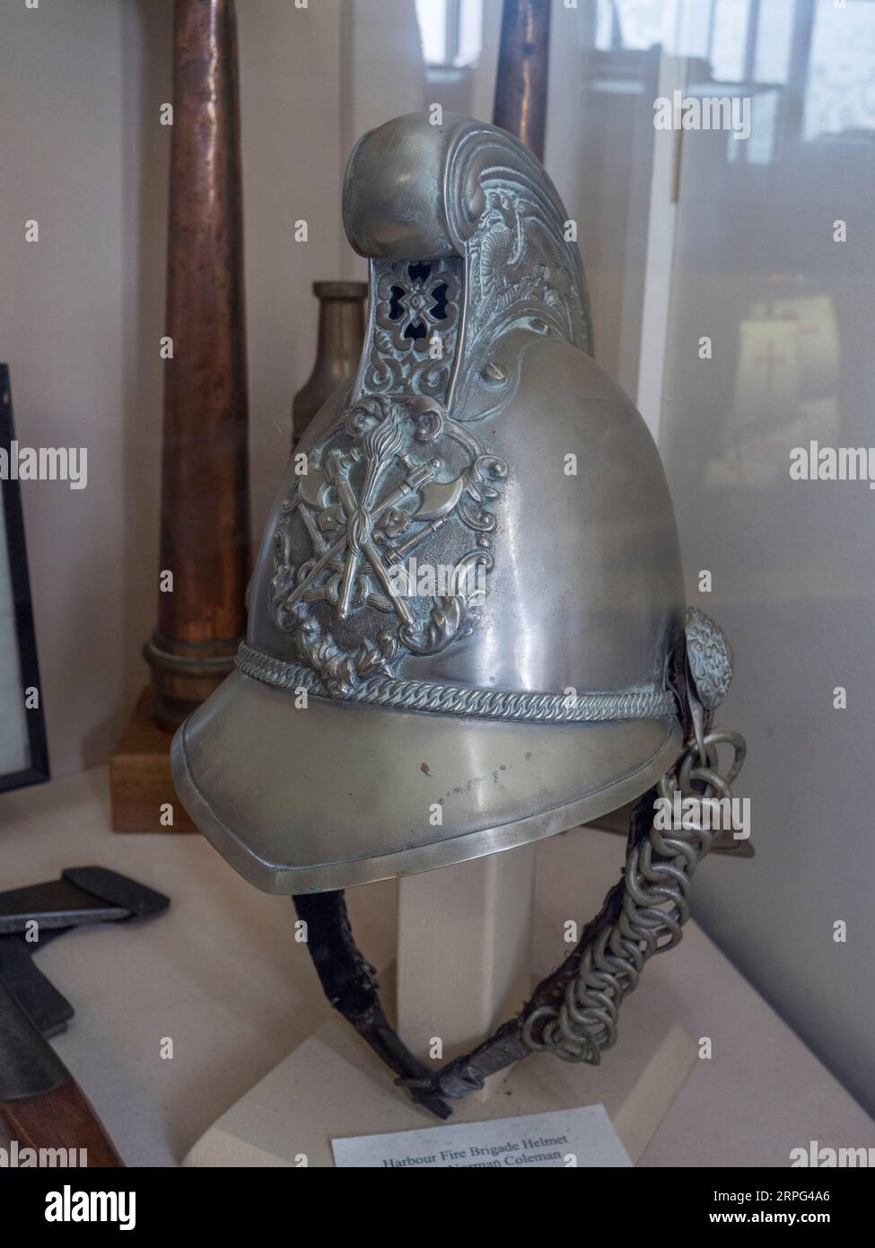 A Harbour Fire Brigade helmet from the 1940s on display in the Newhaven Museum, Newhaven, East Sussex, UK. Stock Photo