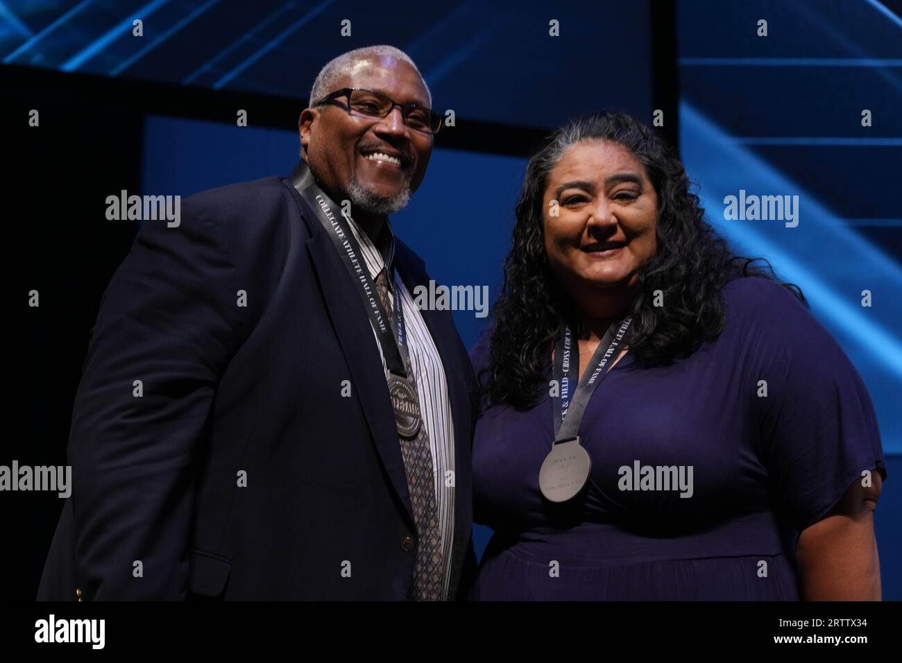 Michael Carter (SMU), left, and Seilala Sua Zumbado (UCLA) pose during the Collegiate Athlete Hall of Fame Induction at the Hult Center for Performing Arts, Thursday, Sept. 14, 2023, in Eugene, Ore. Stock Photo