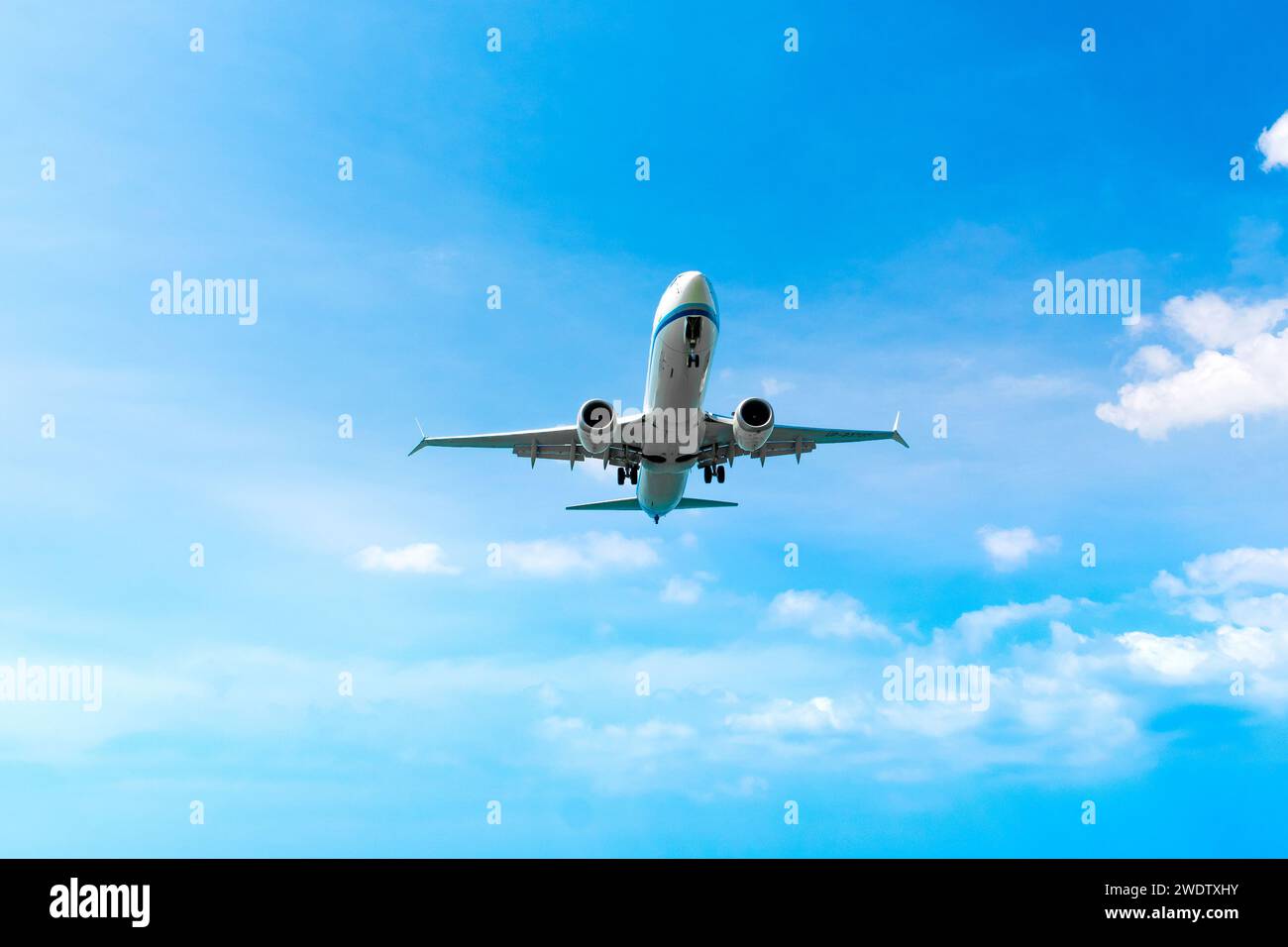 Phuket, Thailand - January 24, 2023: Airplane Boeing 737 MAX 9 of SCAT Airlines is landing at Phuket Airport Stock Photo