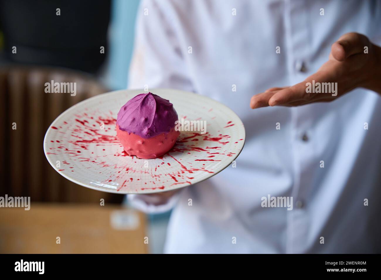 Pastry chef presents an original fruit dessert Stock Photo