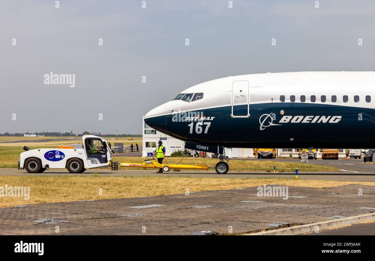 Boeing 737 MAX passenger plane towed towards the runway at the Paris Air Show. France - June 22, 2017 Stock Photo