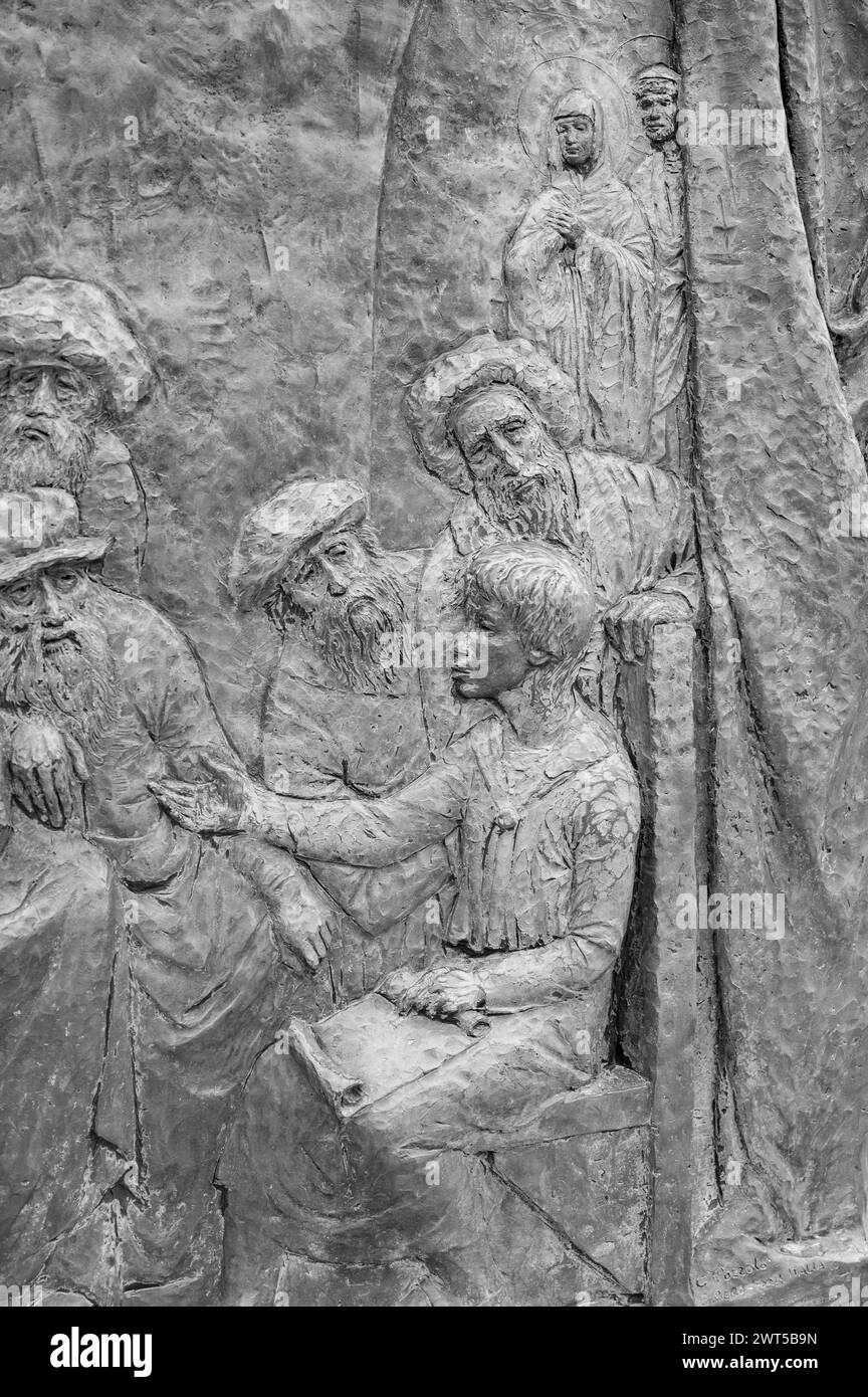 The Finding of Jesus in the Temple – Fifth Joyful Mystery of the Rosary. A relief sculpture on Mount Podbrdo (the Hill of Apparitions) in Medjugorje. Stock Photo