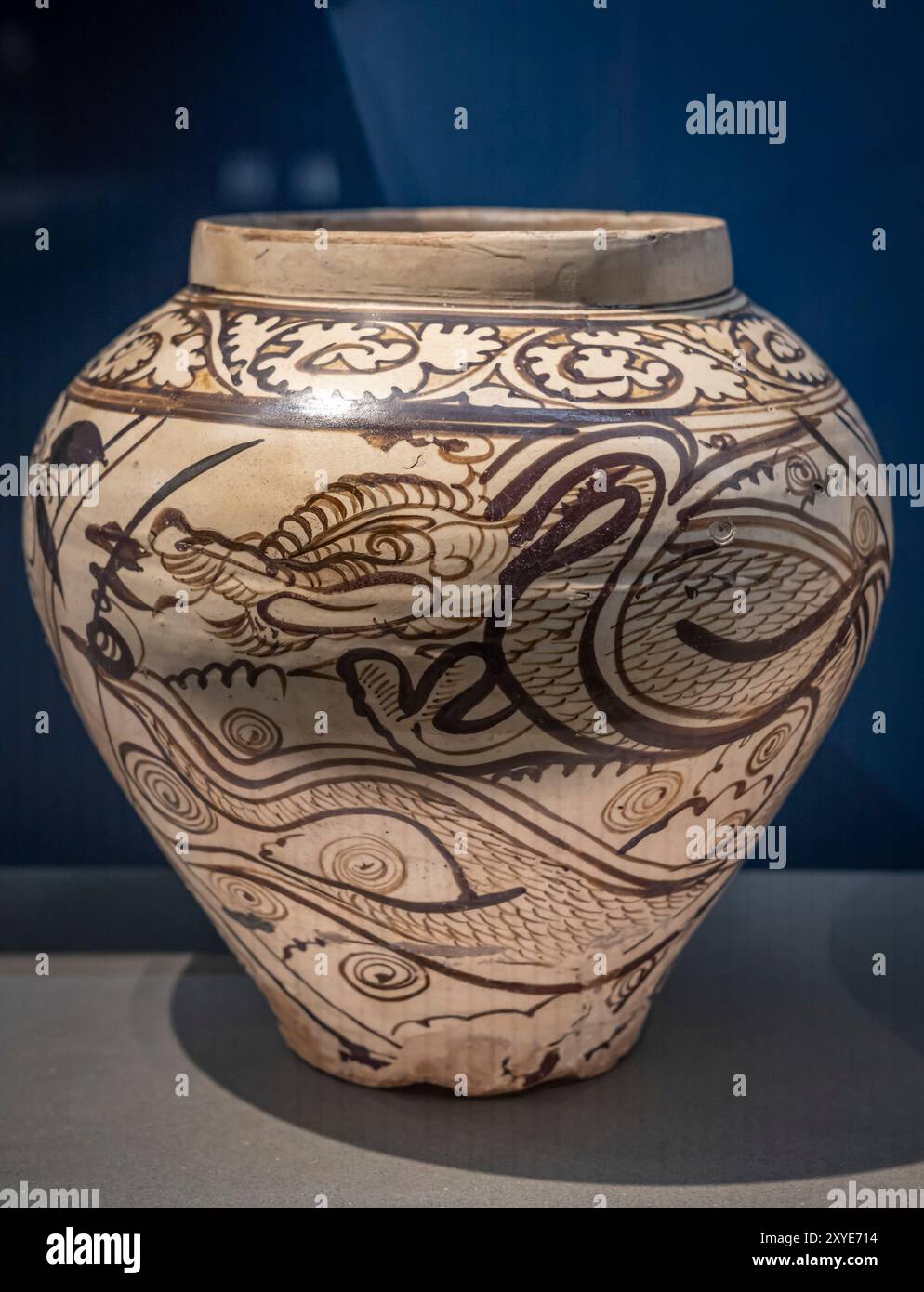 Paris, France - 07 20 2024: Cernuschi museum. Jar decorated with a Dragon and Phoenix, Cizhou type ceramic, stoneware, China Stock Photo