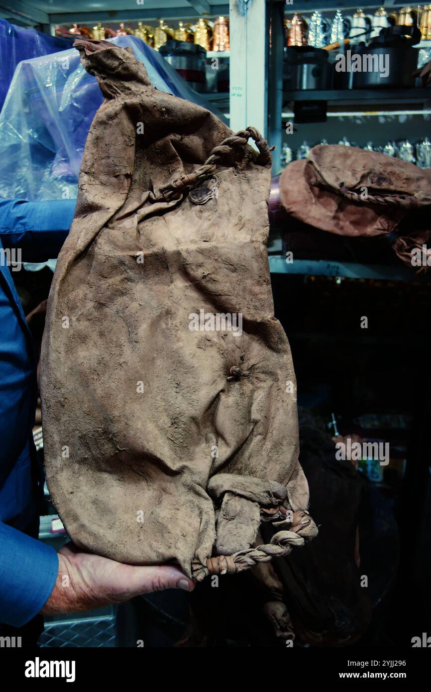 Traditional Bedouin water sack made from a goat skin, Tabuk, Saudi Arabia. No MR or PR Stock Photo