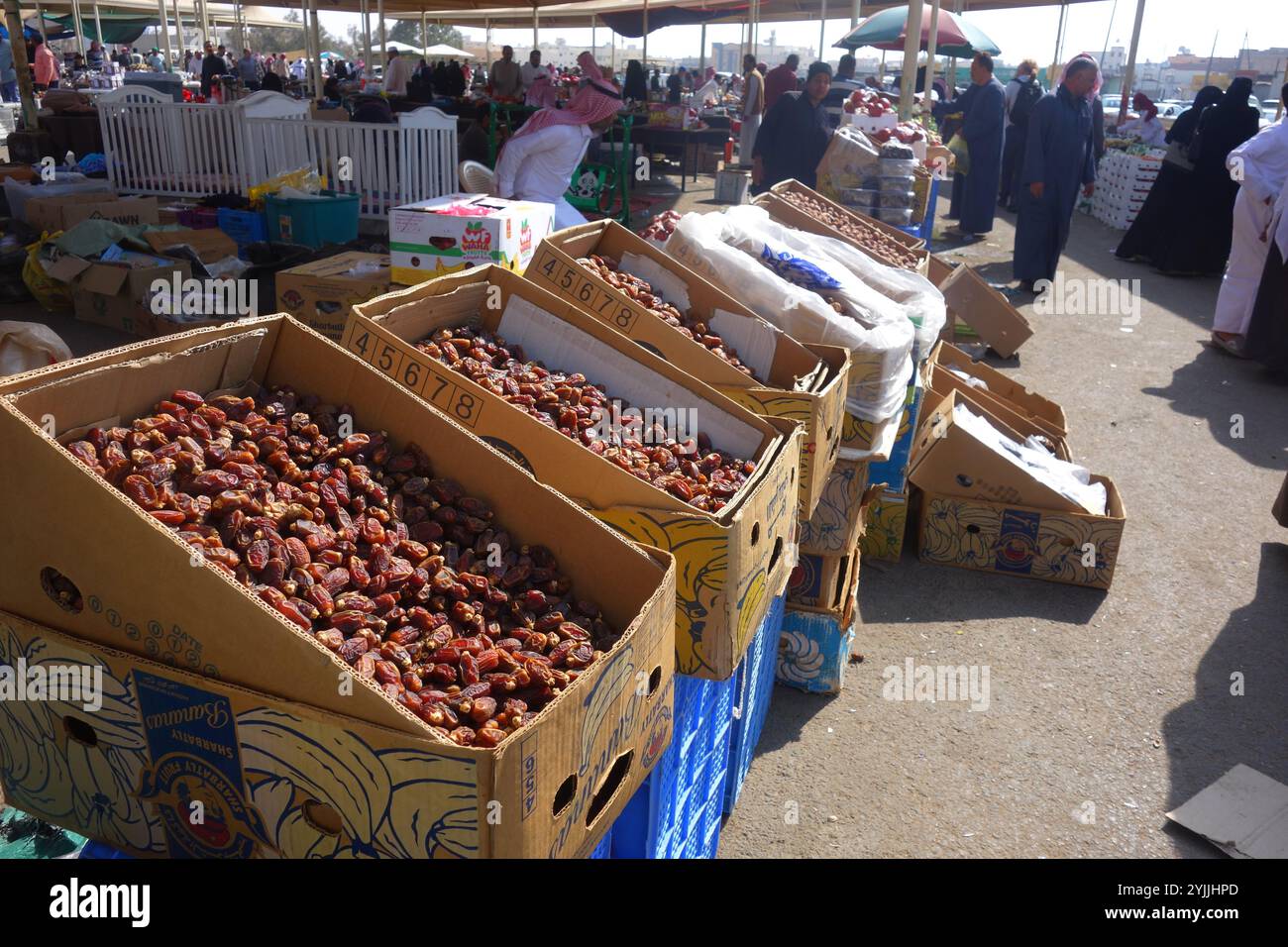 Dried dates for sale at busy open-air market, Tabuk, Saudi Arabia. No MR or PR Stock Photo